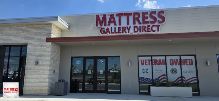 Front entrance of Mattress Gallery Direct Pflugerville, a veteran-owned mattress store in Texas, during grand opening.