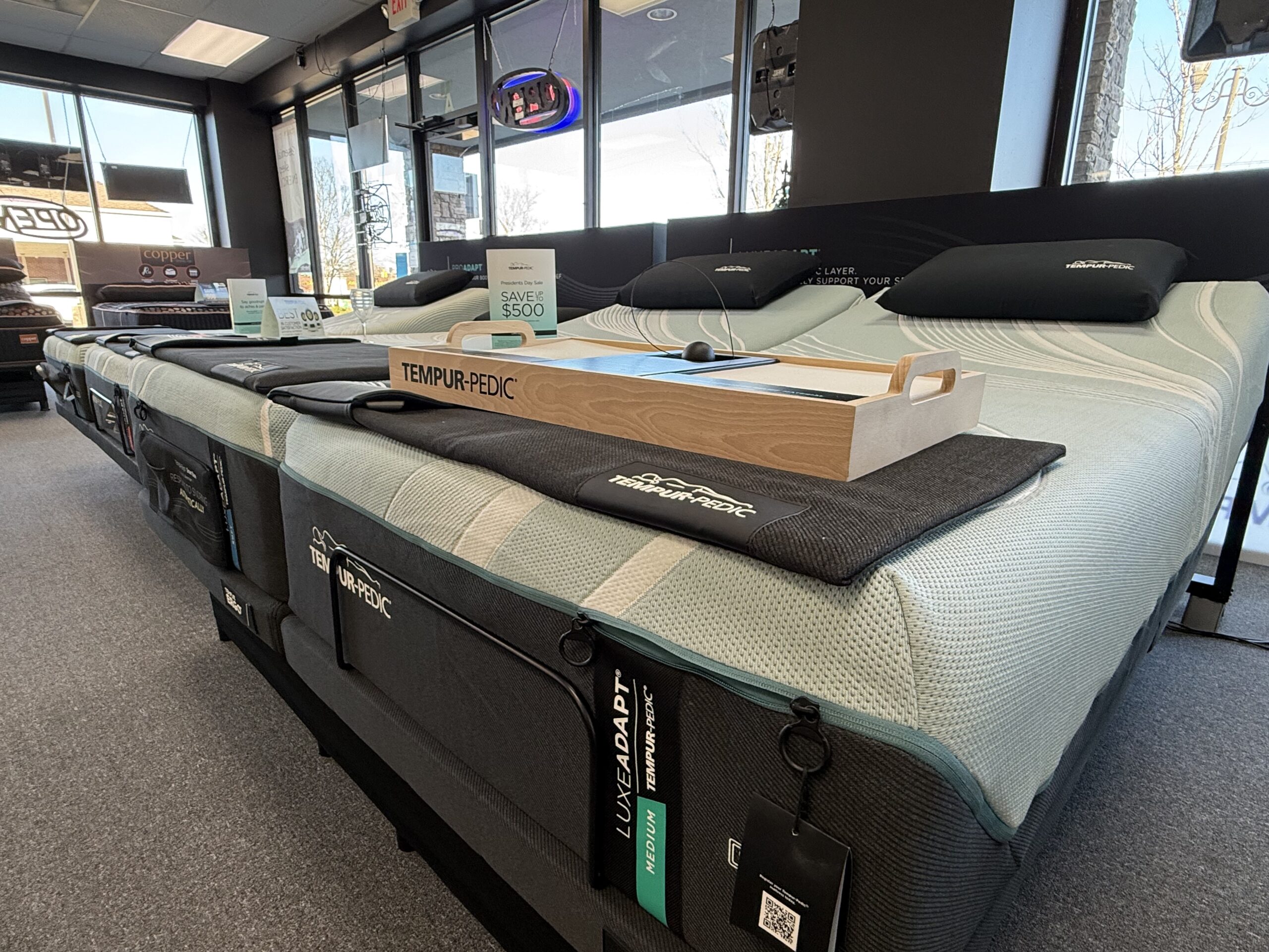 Tempur-Pedic LuxeAdapt Medium Hybrid mattress on display at Mattress Gallery Direct showroom in Murfreesboro TN