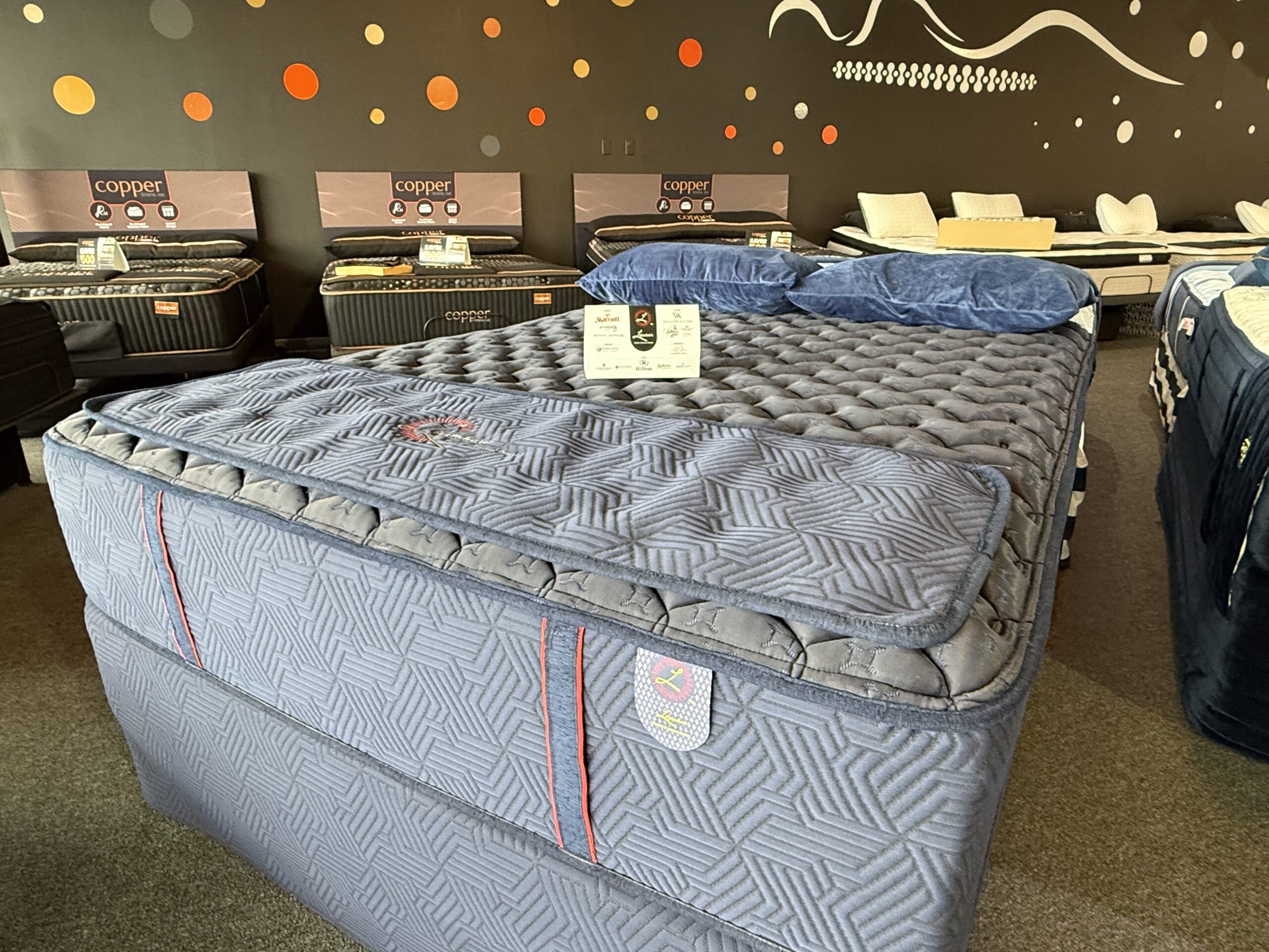 Legendaire Emerick Firm commercial grade mattress with 20 row center support coils and bamboo cooling cover at Mattress Gallery Direct in Murfreesboro Franklin Smyrna TN